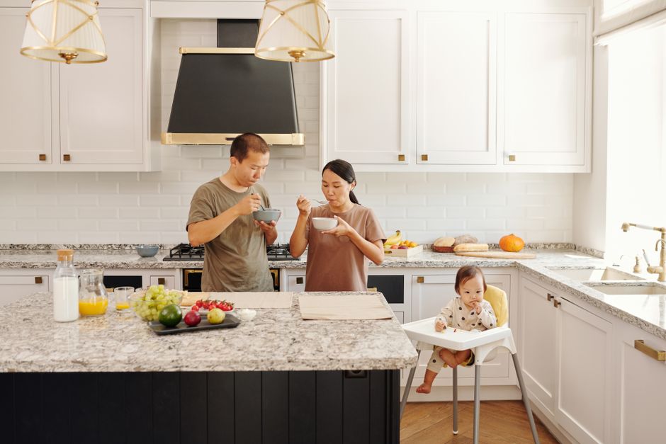 Kitchen with a countertop and cabinets in daylight.
